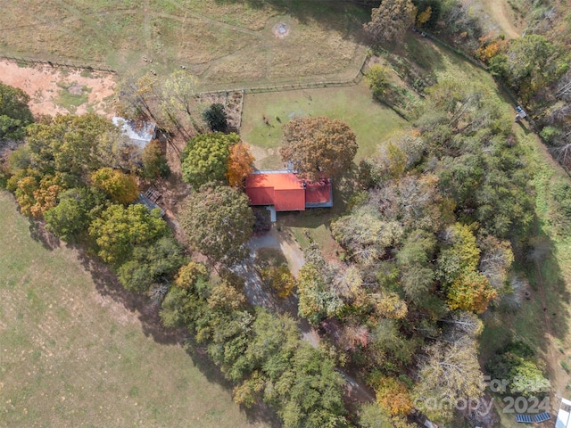 birds eye view of property featuring a rural view