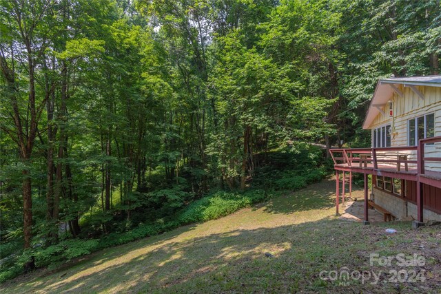 view of yard with a deck