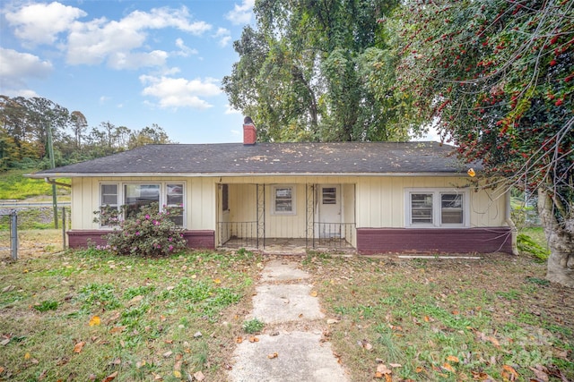 single story home featuring covered porch