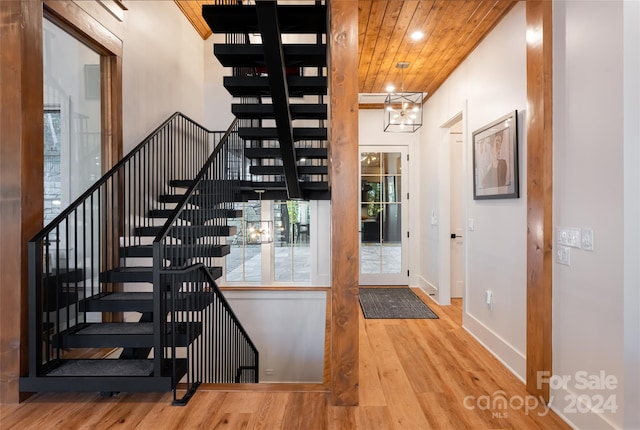 entryway featuring wooden ceiling and wood-type flooring