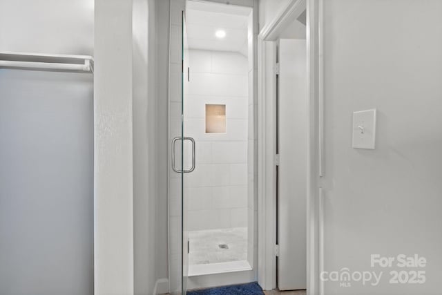 bathroom with an enclosed shower