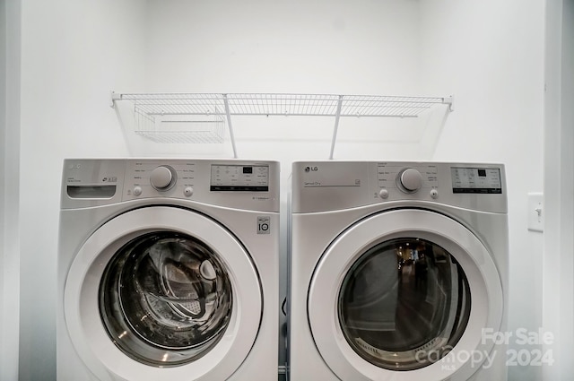 laundry room with separate washer and dryer