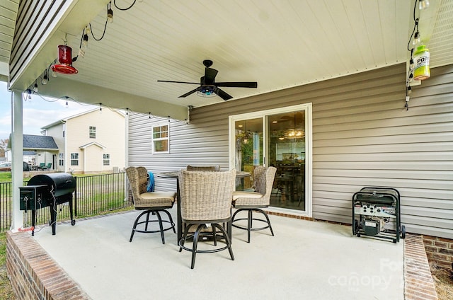 view of patio / terrace featuring ceiling fan and grilling area