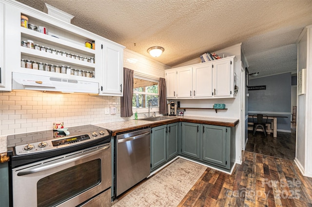 kitchen with sink, white cabinetry, appliances with stainless steel finishes, and a textured ceiling