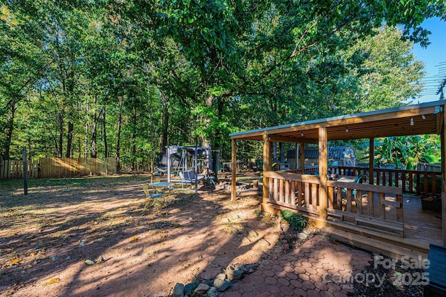 view of yard featuring a deck