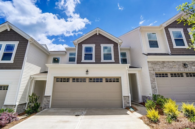 multi unit property featuring a garage