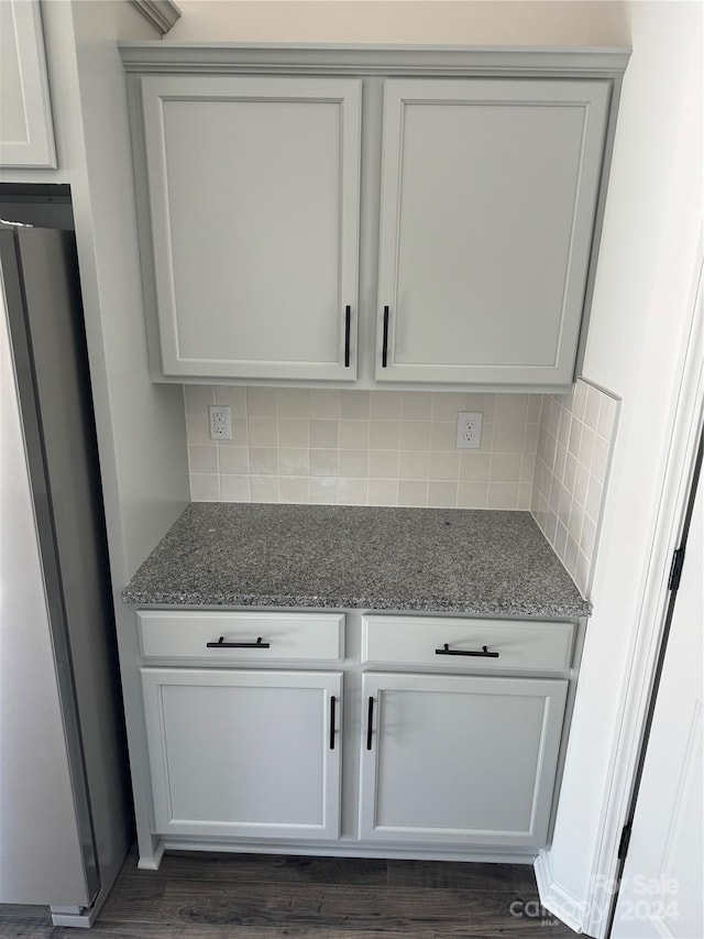 929 Roxburgh Ave Unit 51, Rock Hill, SC 29732 - detailed view of freestanding refrigerator, decorative backsplash, and wood finished floors
