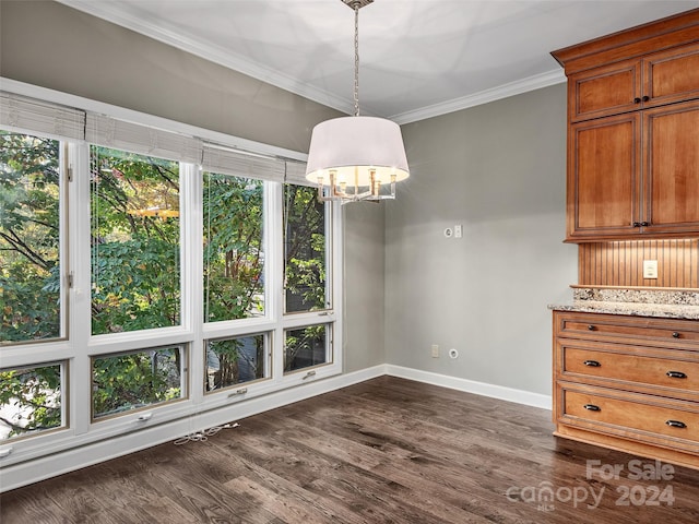 unfurnished dining area featuring ornamental molding and dark hardwood / wood-style flooring