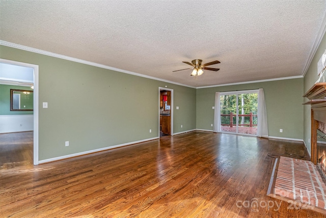 unfurnished living room featuring hardwood / wood-style floors, ceiling fan, a textured ceiling, a fireplace, and crown molding