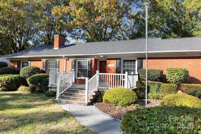 single story home with a front yard