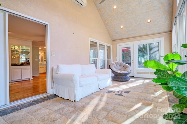 unfurnished sunroom with lofted ceiling, french doors, a wall mounted AC, and sink