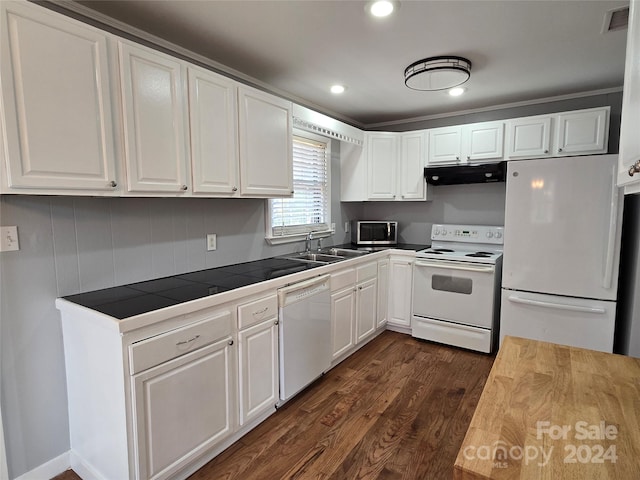 kitchen with white appliances, sink, tile countertops, white cabinetry, and dark hardwood / wood-style floors