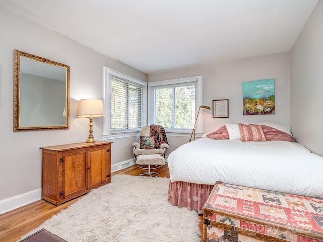 bedroom featuring light hardwood / wood-style floors