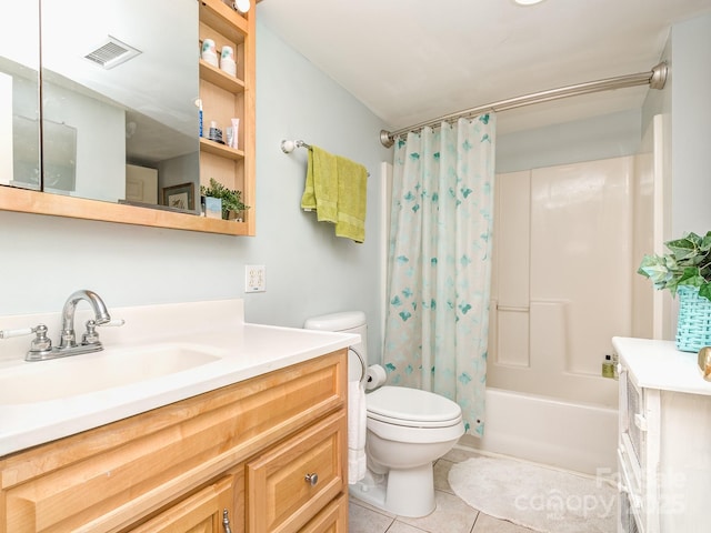 full bathroom with tile patterned flooring, shower / bath combo, vanity, and toilet