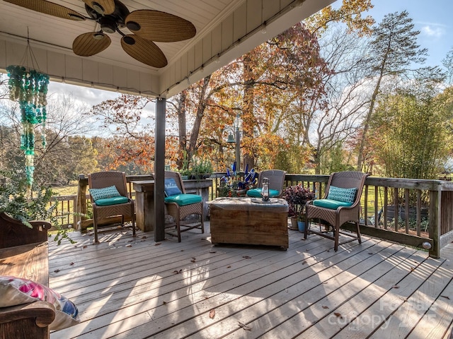 deck featuring an outdoor hangout area and ceiling fan