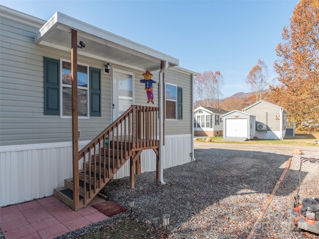 view of front of home featuring an outdoor structure and a garage