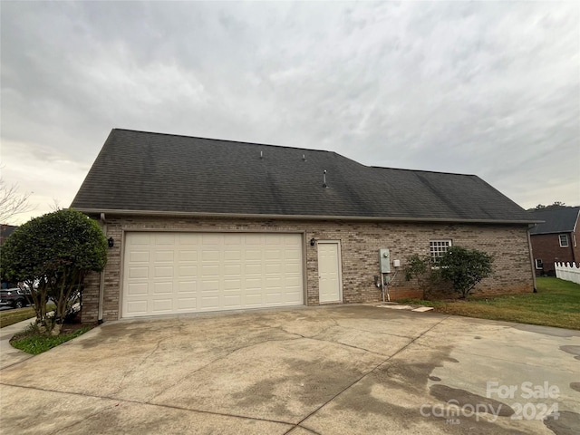 view of property exterior featuring a garage