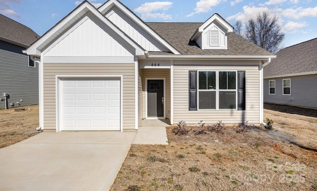 view of front of home with a garage and a front lawn