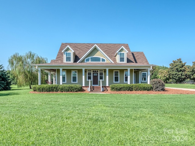 view of front of house featuring a porch and a front lawn