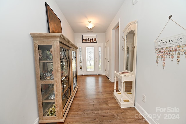 interior space with hardwood / wood-style floors