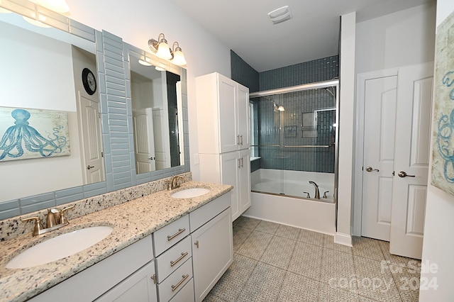 bathroom with vanity and tile patterned floors