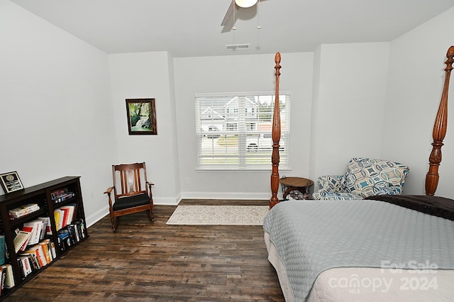 bedroom featuring dark hardwood / wood-style flooring and ceiling fan