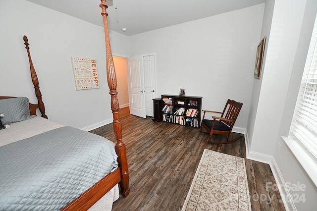 bedroom featuring dark hardwood / wood-style floors