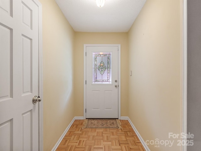 doorway featuring light parquet floors