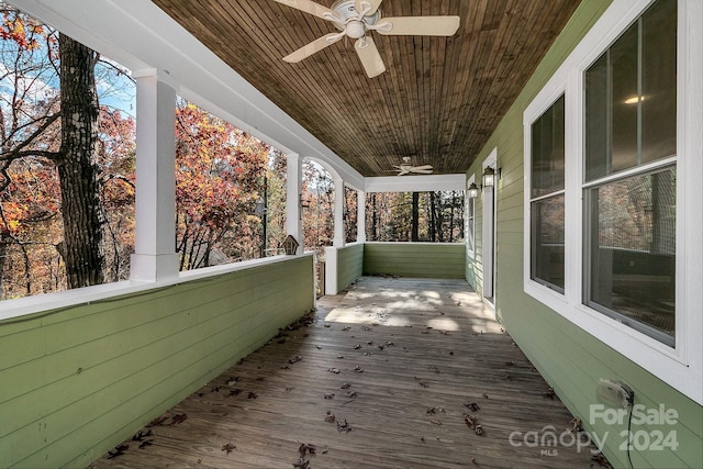 deck featuring ceiling fan and a porch