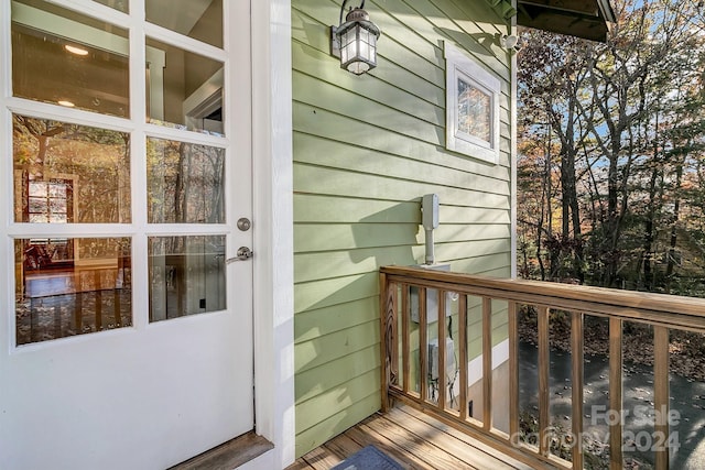 property entrance with a deck