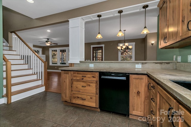 kitchen featuring hanging light fixtures, dark tile patterned flooring, brown cabinets, dishwasher, and a peninsula