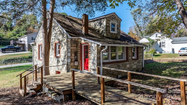 view of front of home with a deck