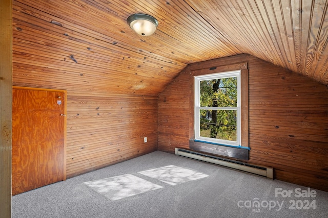 bonus room featuring wood ceiling, vaulted ceiling, a baseboard heating unit, carpet floors, and wood walls