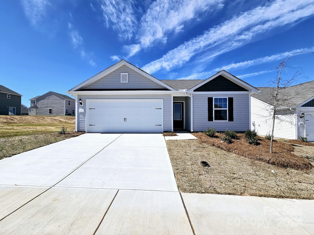 single story home with a garage