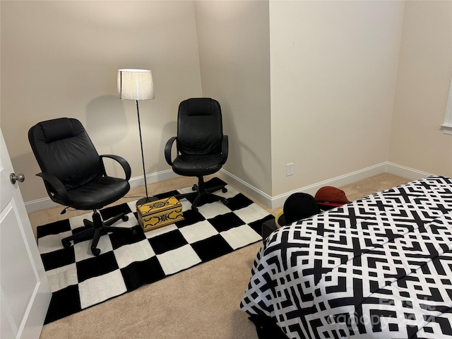 bedroom featuring light colored carpet