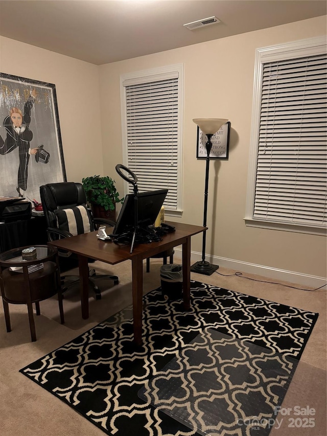 office space with carpet flooring and baseboards