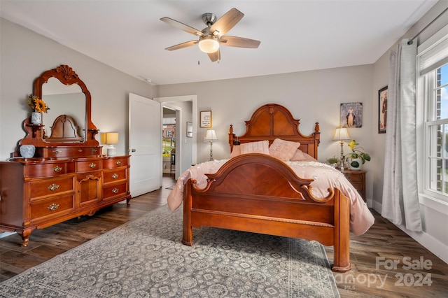 bedroom featuring dark hardwood / wood-style floors and ceiling fan