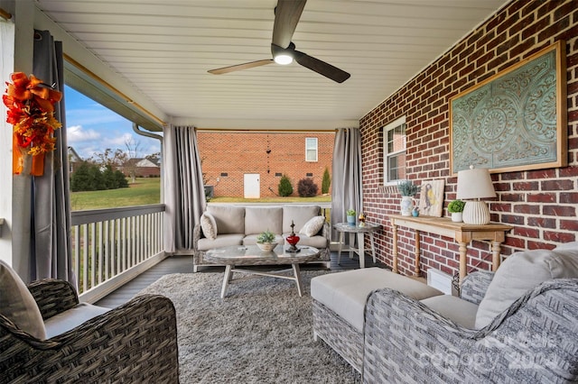 sunroom / solarium with ceiling fan