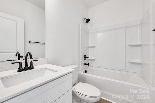 full bath with toilet, vanity, and shower / tub combination