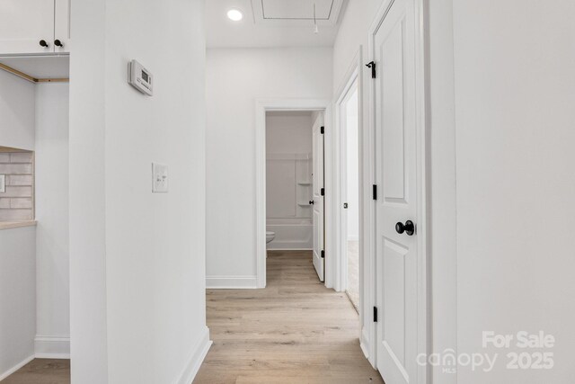606 Meadow St, Spencer, NC 28159 - hall featuring light wood-type flooring, attic access, recessed lighting, and plenty of natural light