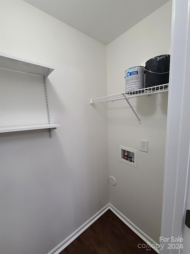 laundry room with dark wood-type flooring and washer hookup