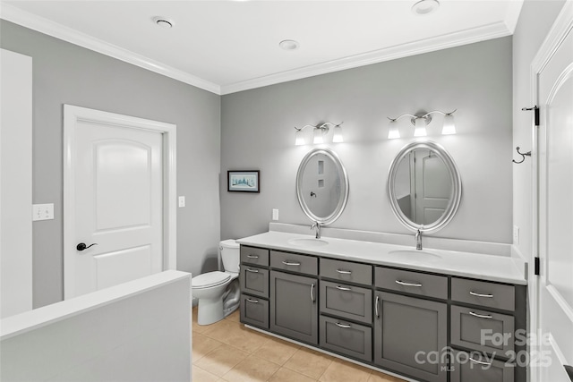 bathroom featuring ornamental molding, toilet, tile patterned flooring, and vanity