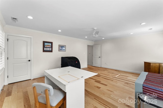 office with ceiling fan, ornamental molding, and light wood-type flooring