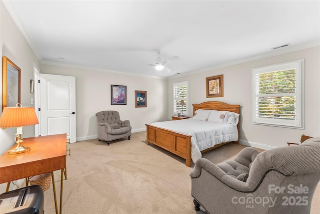 carpeted bedroom with ceiling fan, crown molding, and multiple windows