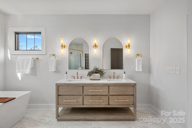 bathroom featuring vanity and shower with separate bathtub