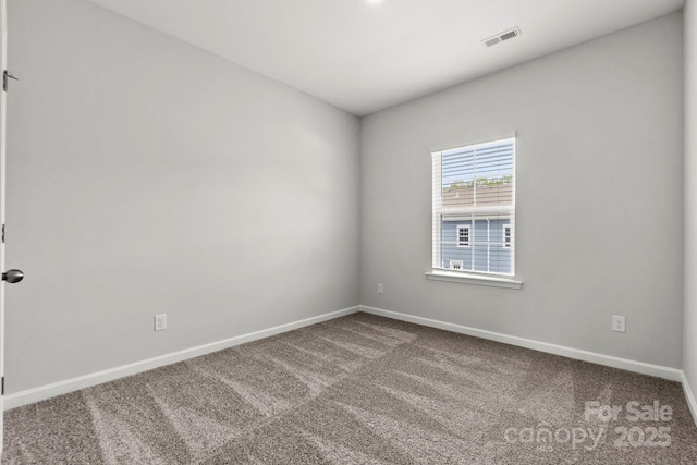 view of carpeted spare room