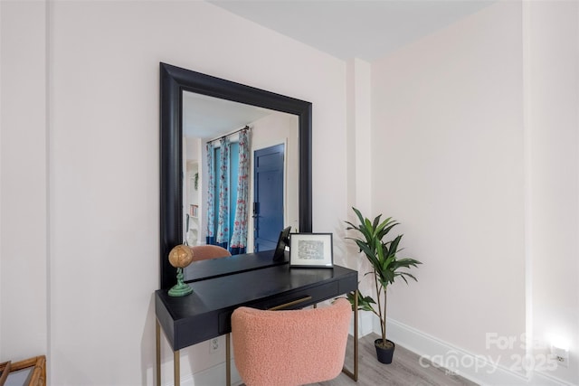 office area with wood-type flooring