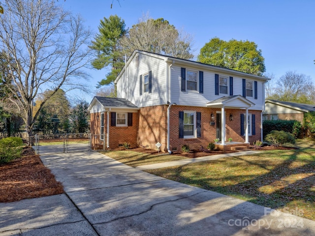 view of front of home with a front yard