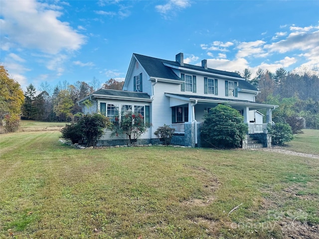 view of property exterior featuring a lawn and a porch