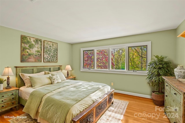 bedroom featuring light hardwood / wood-style floors